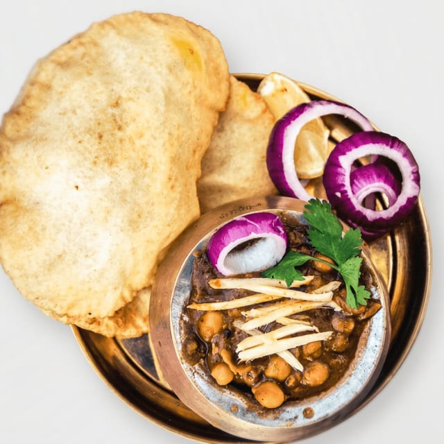 Choley Bhatura (Garbanzo Curry with Puff Bread).